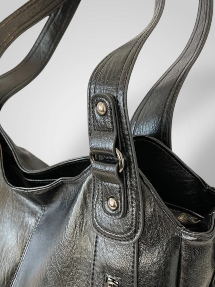 Zara | Bolsa de ombro elegante com detalhes metálicos e compartimentos espaçosos