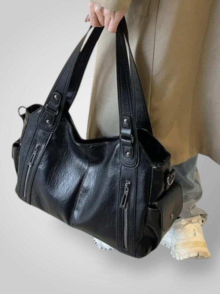 Zara | Bolsa de ombro elegante com detalhes metálicos e compartimentos espaçosos