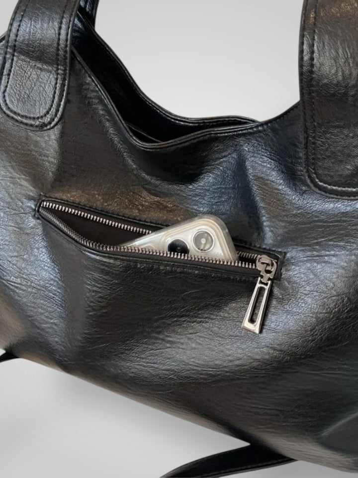 Zara | Bolsa de ombro elegante com detalhes metálicos e compartimentos espaçosos