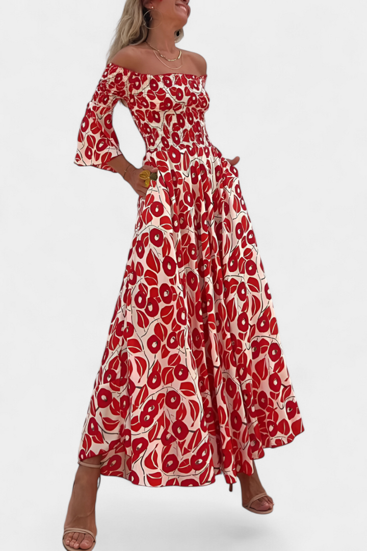 Vestido floral marino con hombros descubiertos