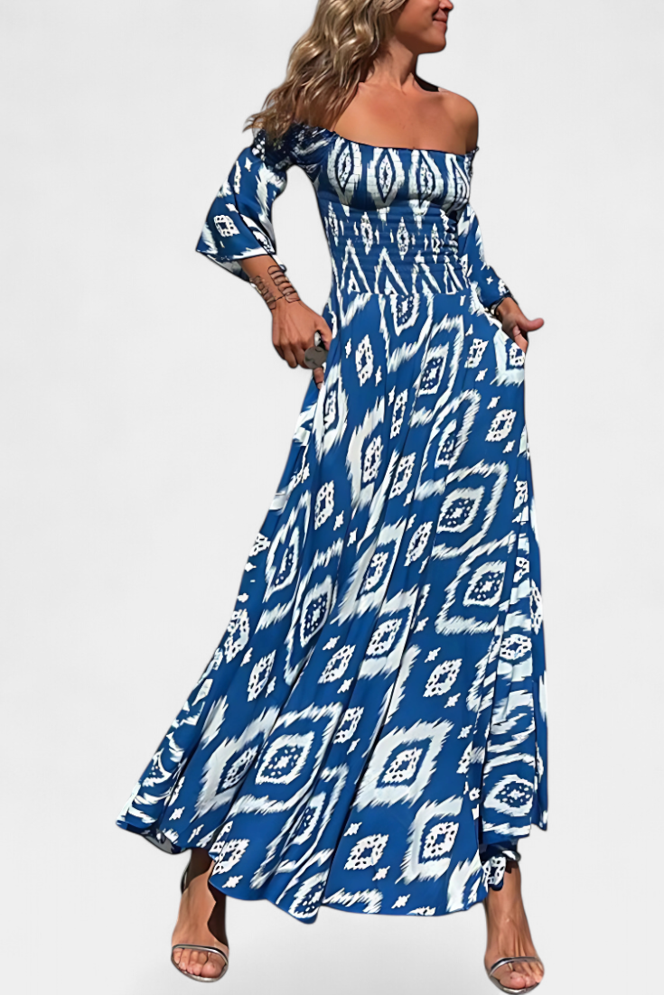 Vestido floral marino con hombros descubiertos