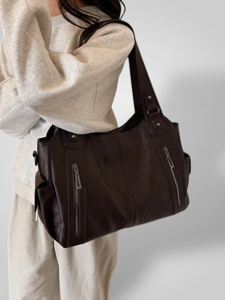 Zara | Bolsa de ombro elegante com detalhes metálicos e compartimentos espaçosos