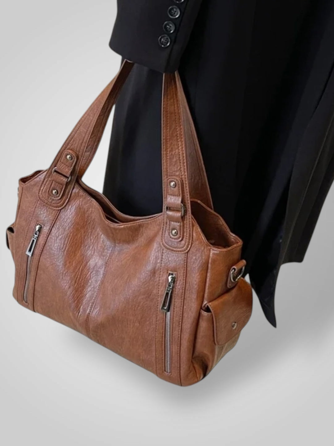 Zara | Bolsa de ombro elegante com detalhes metálicos e compartimentos espaçosos