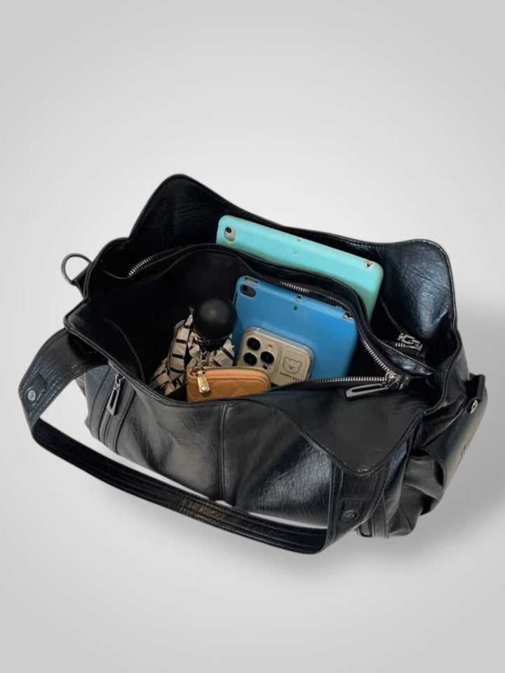 Zara | Bolsa de ombro elegante com detalhes metálicos e compartimentos espaçosos