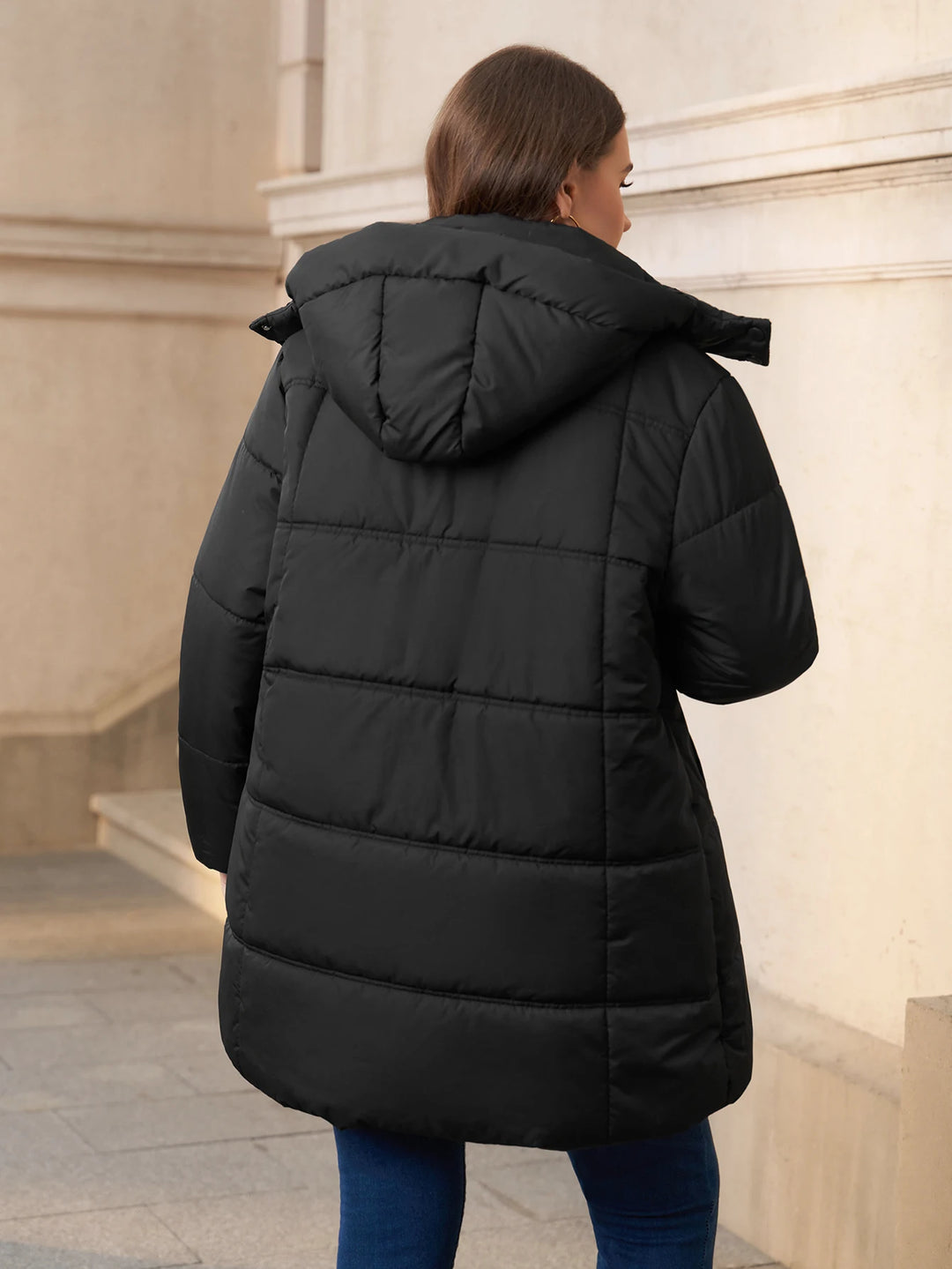 Manteau matelassé isolant Donatella avec capuche amovible et fermeture zippée