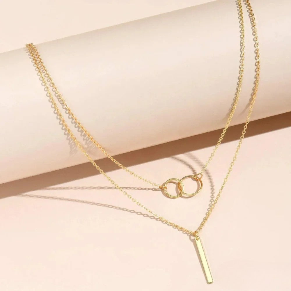 Colar Retrô Dourado com Pingente de Duplo Círculo