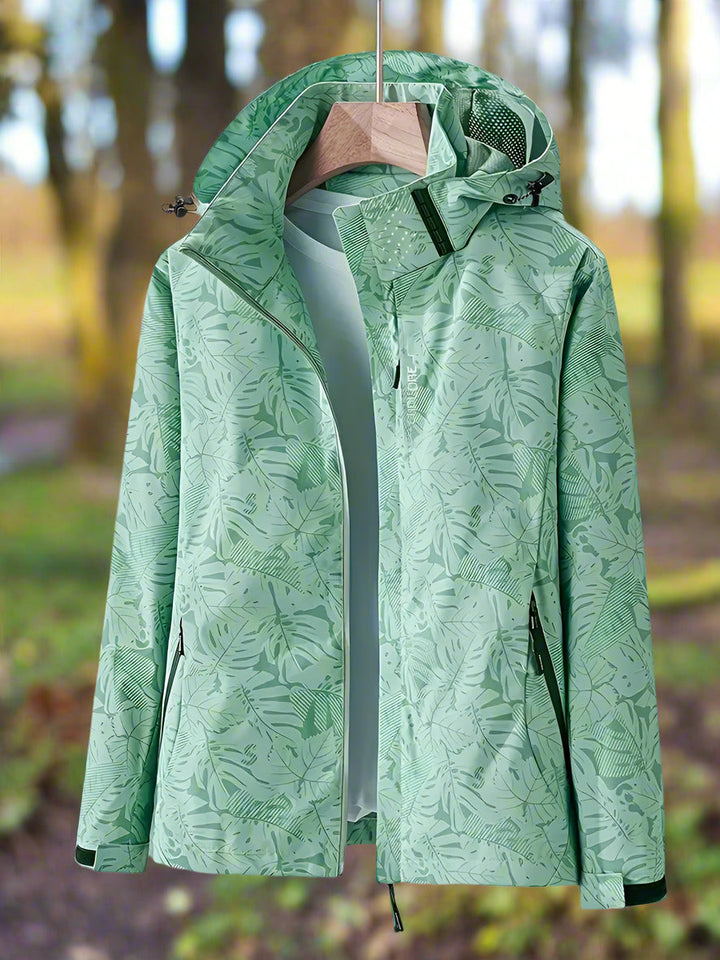 Giacca impermeabile da donna con cappuccio e stampa di foglie botaniche
