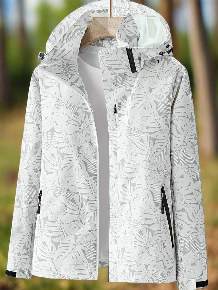 Giacca impermeabile da donna con cappuccio e stampa di foglie botaniche